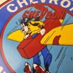 Vintage Chevron Gasoline Sign – Airplane Cartoon Aviation Gas Ad Porcelain Sign - Image 3