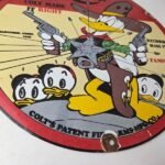 Vintage Colt Fire Arms Sign – Donald Duck Revolvers Pistols Guns Gas Pump Sign - Image 11
