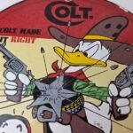 Vintage Colt Fire Arms Sign – Donald Duck Revolvers Pistols Guns Gas Pump Sign - Image 3