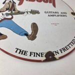 Vintage Gibson Guitars – Acoustic Electric Bass Porcelain Gas Station Goofy Sign - Image 11
