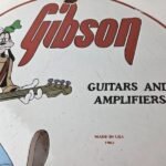 Vintage Gibson Guitars – Acoustic Electric Bass Porcelain Gas Station Goofy Sign - Image 4