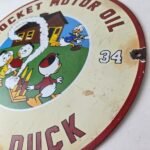 Vintage Rocket Motor Oil Sign – Donald Duck Gas Station Pump Porcelain Sign - Image 13