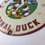 Vintage Rocket Motor Oil Sign – Donald Duck Gas Station Pump Porcelain Sign - Image 14