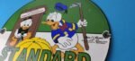 Vintage Standard Gasoline Sign – Unsurpassed Walt Disney Gas Pump Porcelain Sign - Image 9
