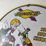 Vintage Sunoco Gasoline Porcelain Sign – Knockless Old Car Cartoon Gas Pump Sign - Image 12